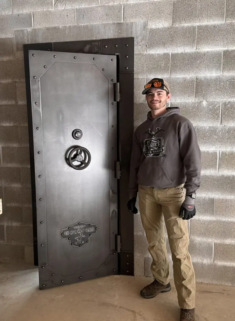 A man standing in front of an open door.