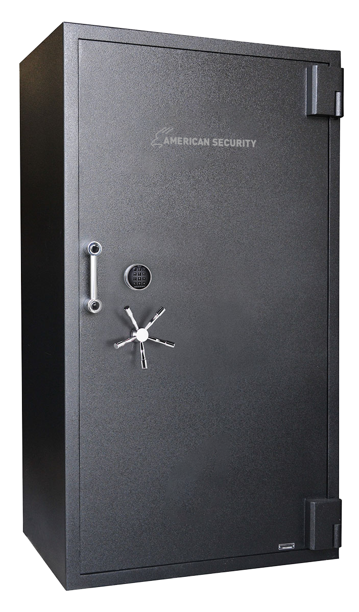 A black american security safe with keys on the door.