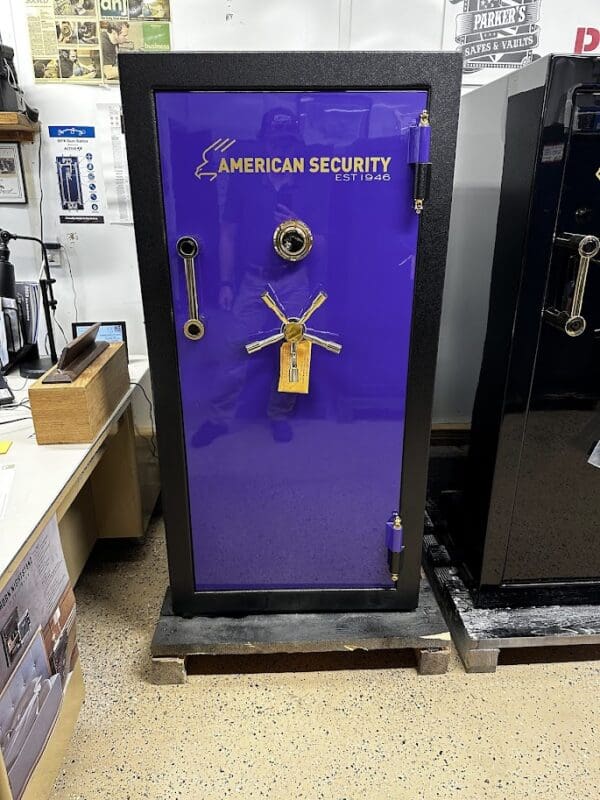 A purple safe with a lock on the door.