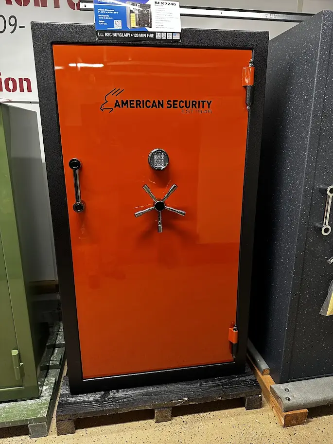 A red safe with the american security logo on it.