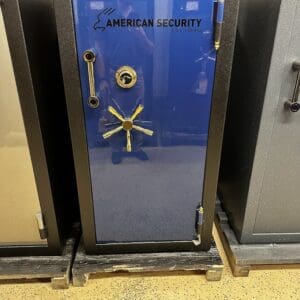 A blue door with a lock and keys on it.