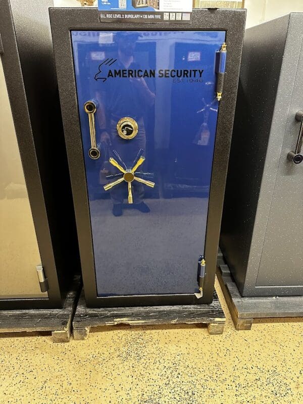 A blue door with a lock and keys on it.