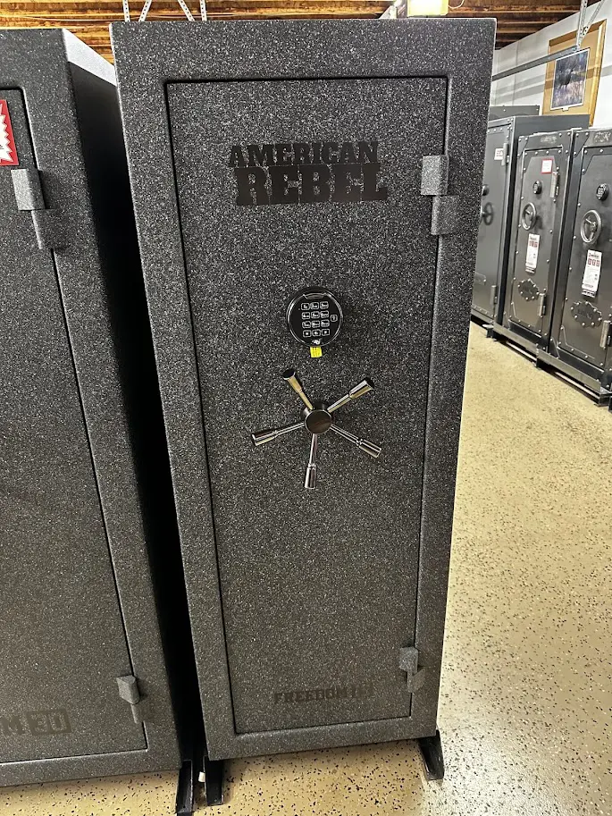 A black gun safe with the words american rebel written on it.