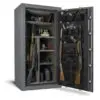 Here's an alt tag for the image: Gun safe with rifles and handguns.