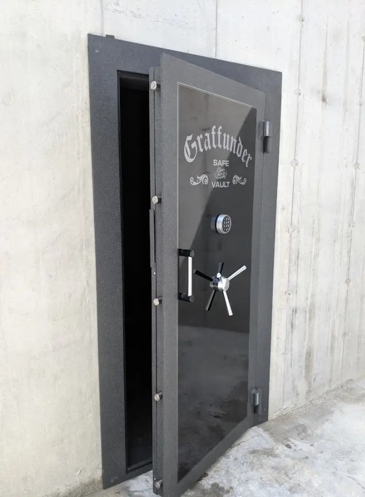 A black door with a clock on it