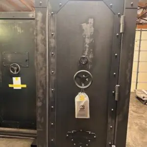 A large black metal door with a lock.