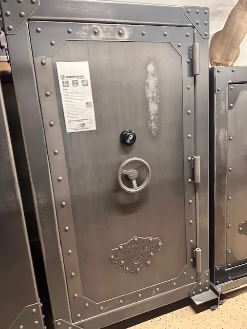 A large metal safe with the door open.