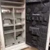 White gun safe with interior organizer.